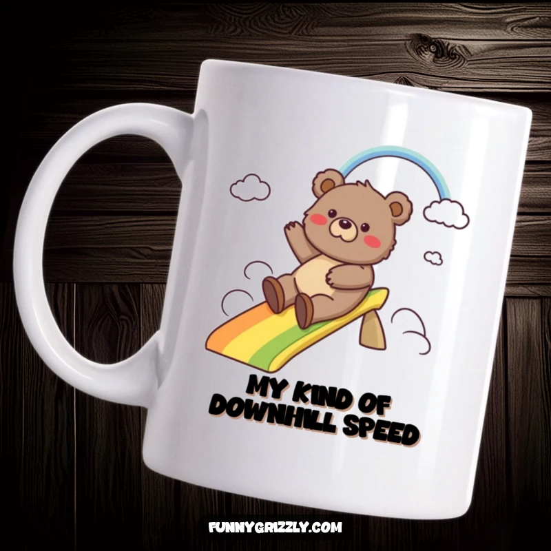 Funny mug showcasing a silly grizzly bear gleefully sliding down a vibrant rainbow, embodying pure, carefree happiness.