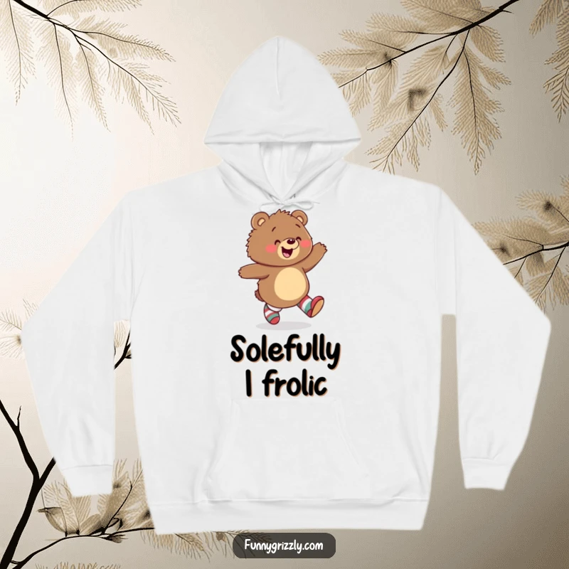 Funny hoodie featuring a happy grizzly bear skipping with glee, showcasing mismatched socks for a touch of playful and cozy humor.