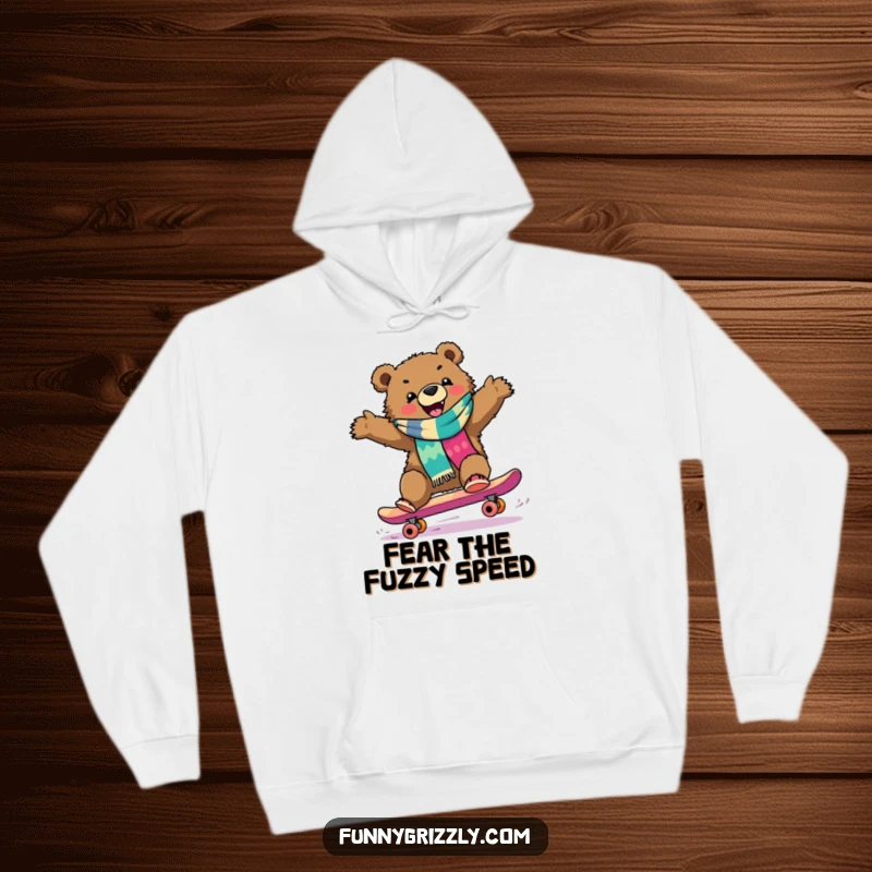 Funny grizzly bear in a colorful scarf gleefully riding a skateboard downhill, featured on a warm and cozy hoodie.