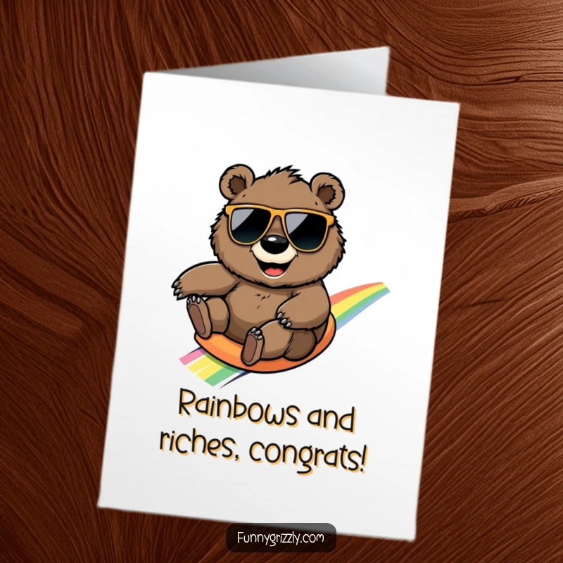 Funny Free Printable Congratulations Card: Smiling grizzly bear in sunglasses sliding down a rainbow, celebrating success.