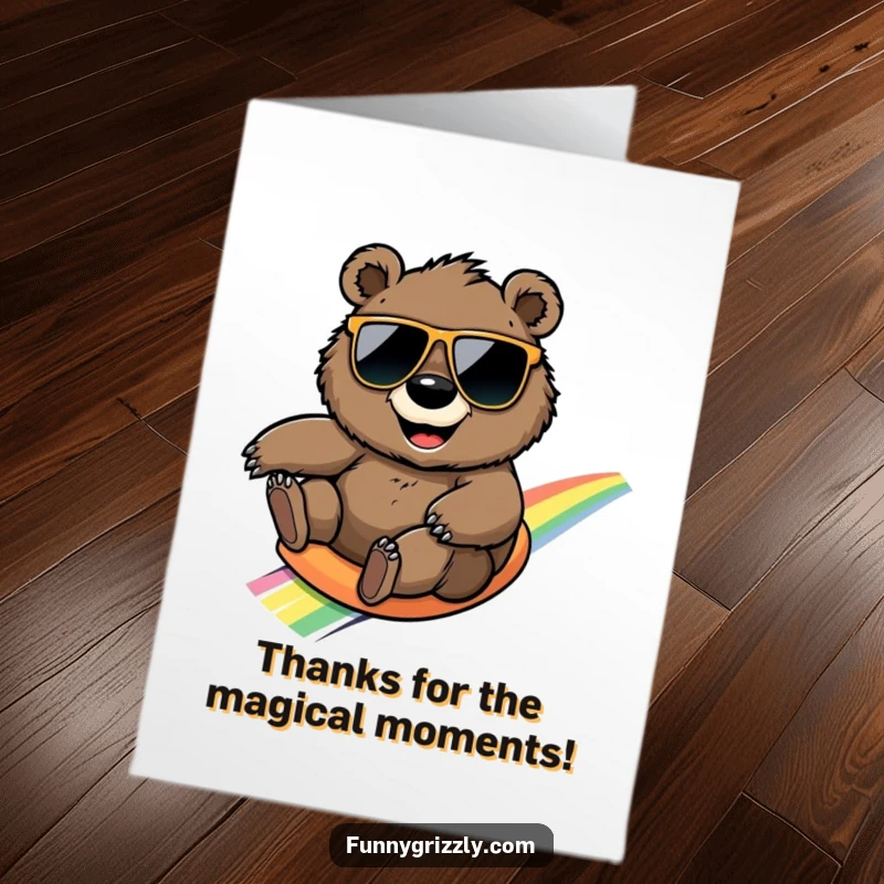 Funny Free Printable Thank You Card: Smiling grizzly bear in sunglasses sliding down a rainbow, expressing thanks.
