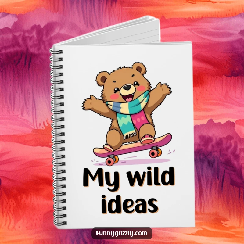 Funny grizzly bear in a scarf joyfully skateboarding downhill, featured on the cover of a humorous notebook.