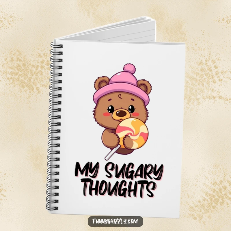 Funny grizzly bear in a novelty hat peeking from behind a giant lollipop, on the cover of a whimsical notebook.