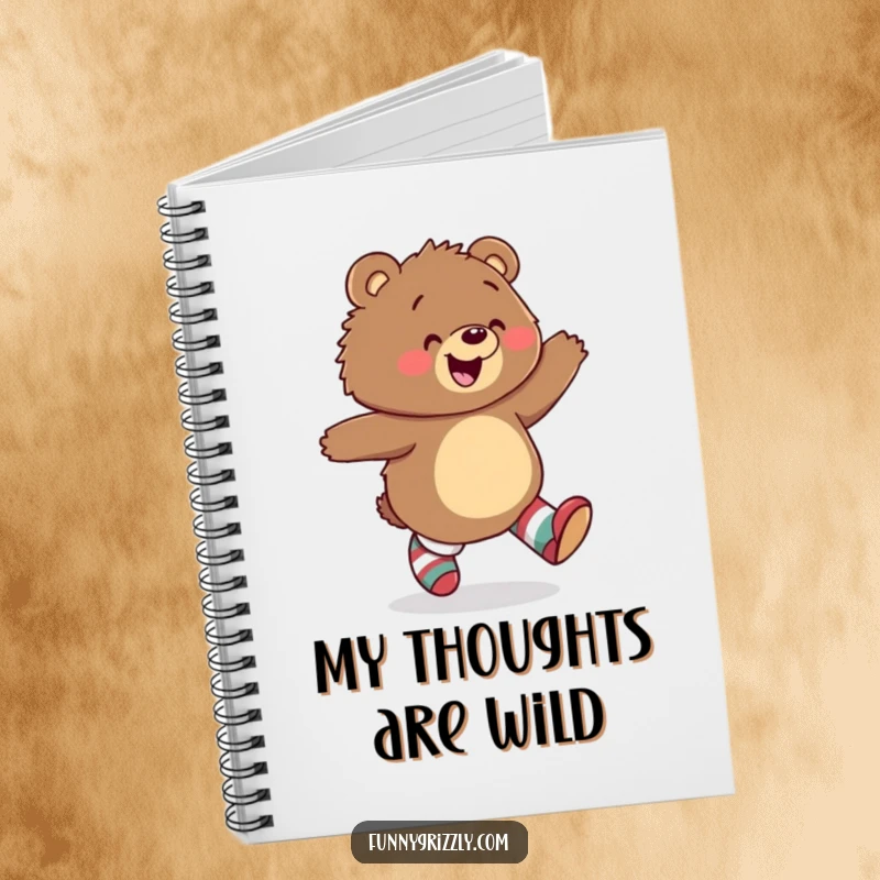 Funny notebook featuring a happy grizzly bear skipping with glee, wearing mismatched socks, perfect for jotting down colorful ideas.